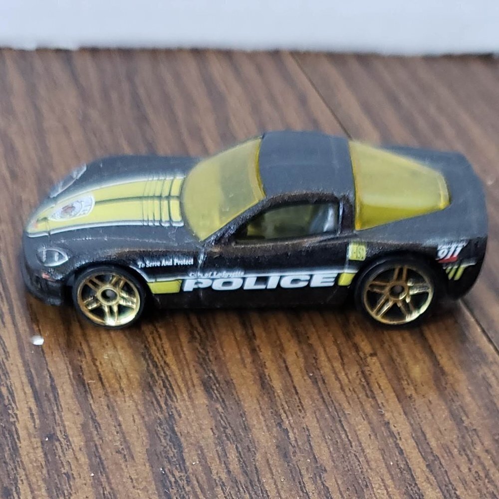 Hot Wheels 2011 C6 Corvette HW Main Street City of Lafayette Police Black